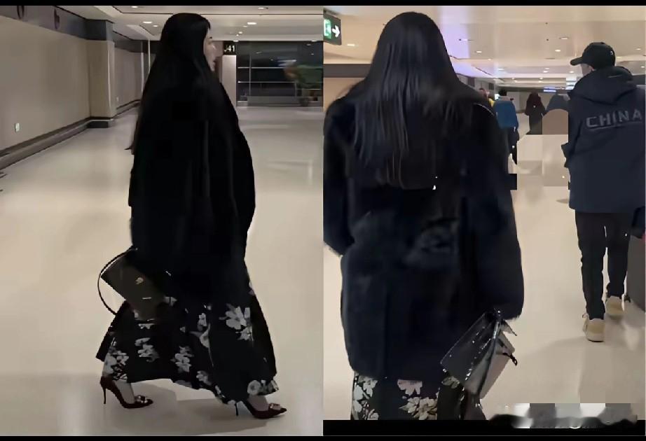 网友：无论是背影还是侧面，都像一个熊瞎子穿着裙子出来了[无奈吐舌]。这是在哈尔滨，