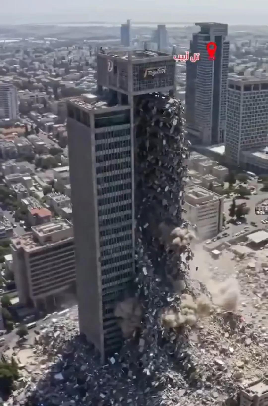特拉维夫的一栋建筑被整体炸塌，相邻的大楼则安然无恙，就像是在现场定点爆破的一样。