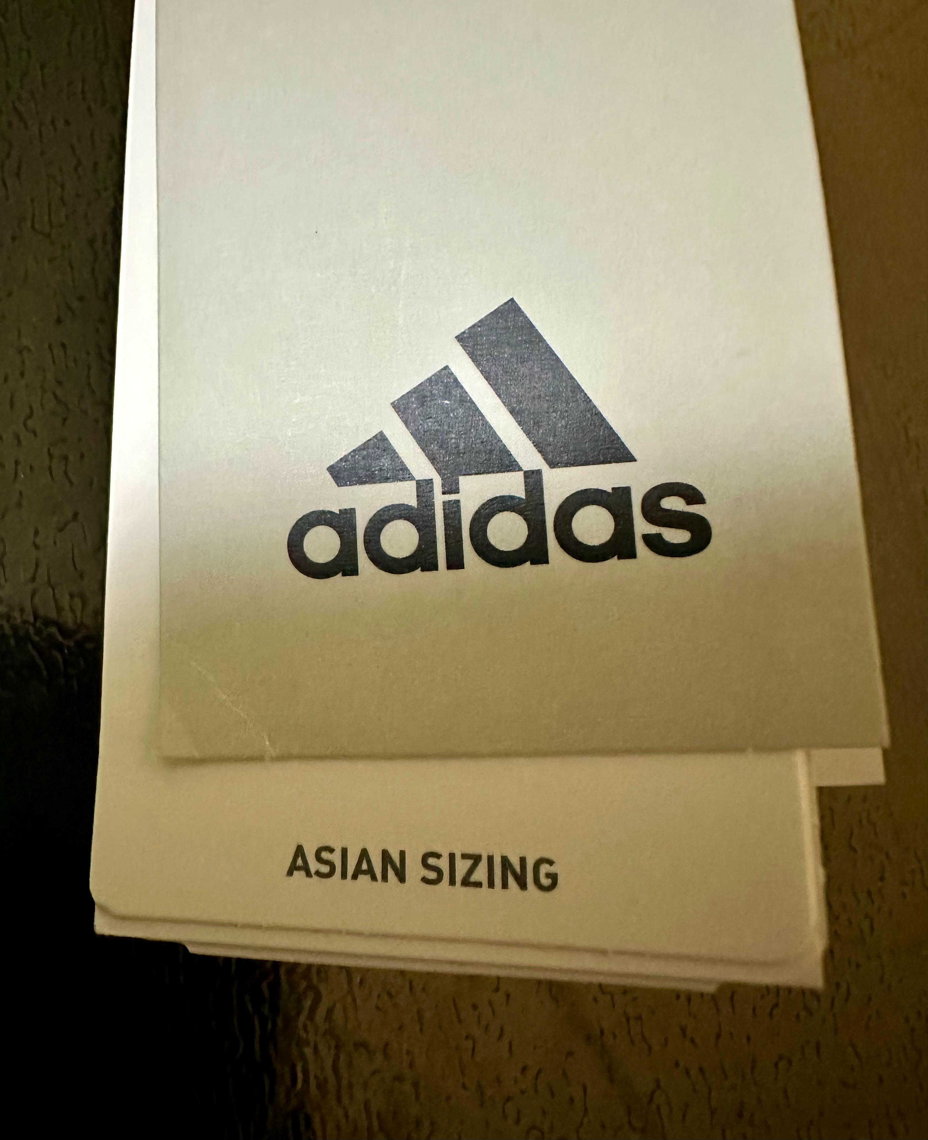 买了件衣服，剪吊牌的时候，看到了代工模式。​​​