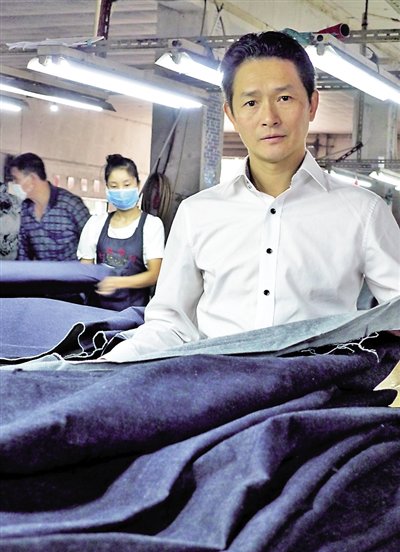 彭长春: 靠一辆三轮车打拼成"牛仔大王"